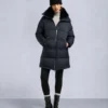 Belle Dune lång shearling-trim pufferjacka