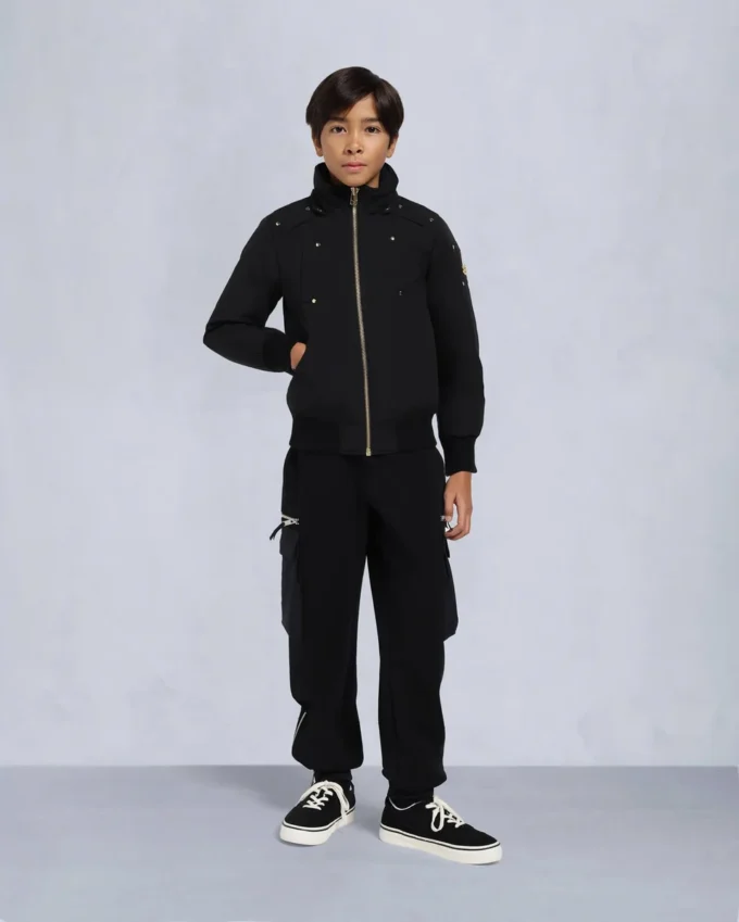 Unisexbomberjacka för barn med originalfårskinnskant